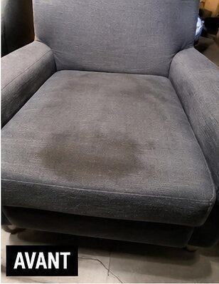 Fauteuil gris foncé avant nettoyage — auréoles sur l'assise